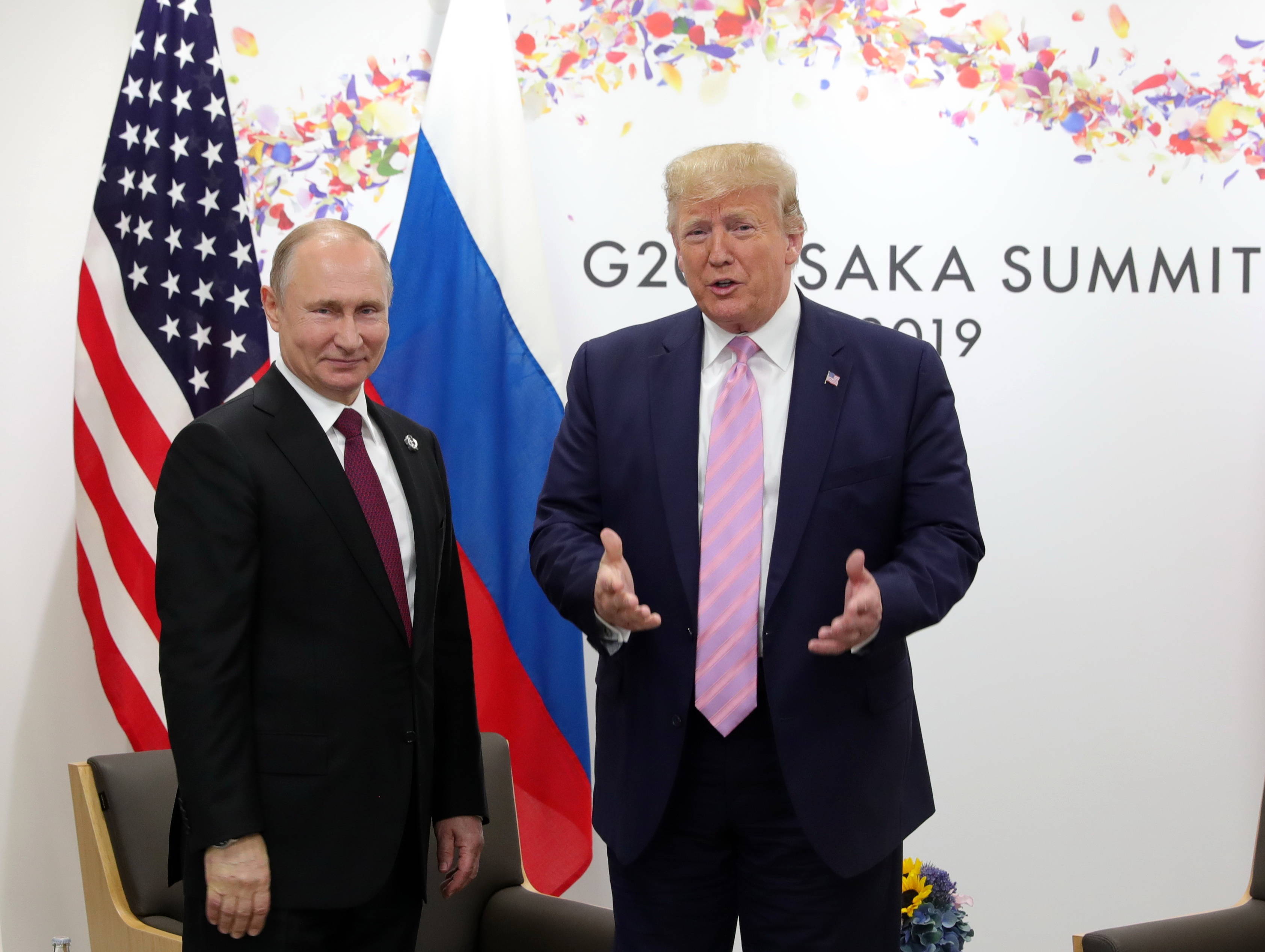 Владімір Путін і Дональд Трамп на самміті в Осаці 2019 фотоілюстрація Fot. PAP/EPA/MICHAEL KLIMENTYEV/SPUTNIK/KREMLIN POOL 