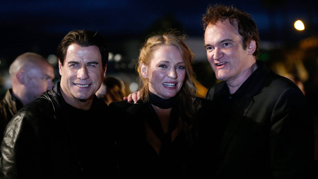 Od lewej: John Travolta, Uma Thurman i Quentin Tarantino. Fot. PAP/EPA/JULIEN WARNAND