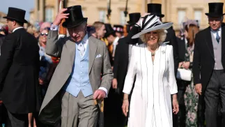 Karol III z żoną Kamilą podejmował setki gości na pierwszym z serii dorocznych wiosennych przyjęć w ogrodach Pałacu Buckingham, fot. PAP/Avalon